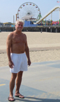 Bill in trunks in front of Santa Monica pier - right side