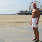 Bill in trunks in front of Santa Monica pier - left side