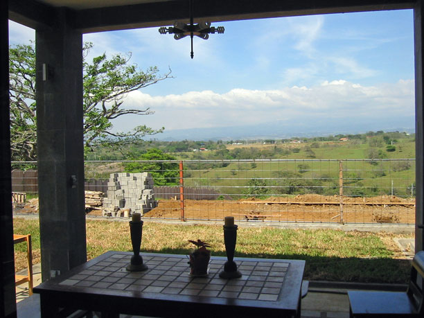 View from sliding door of the house Carlos built.
